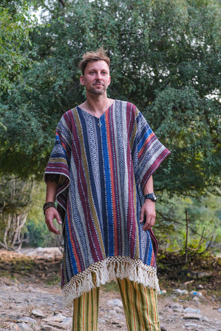 Saisha one-size kaftan styled as unisex boho wear on a male model, front view