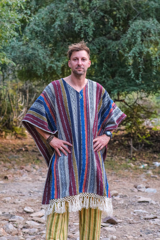 Front view of the Saisha kaftan showing wide 3/4 sleeves and the multicolor stripe pattern