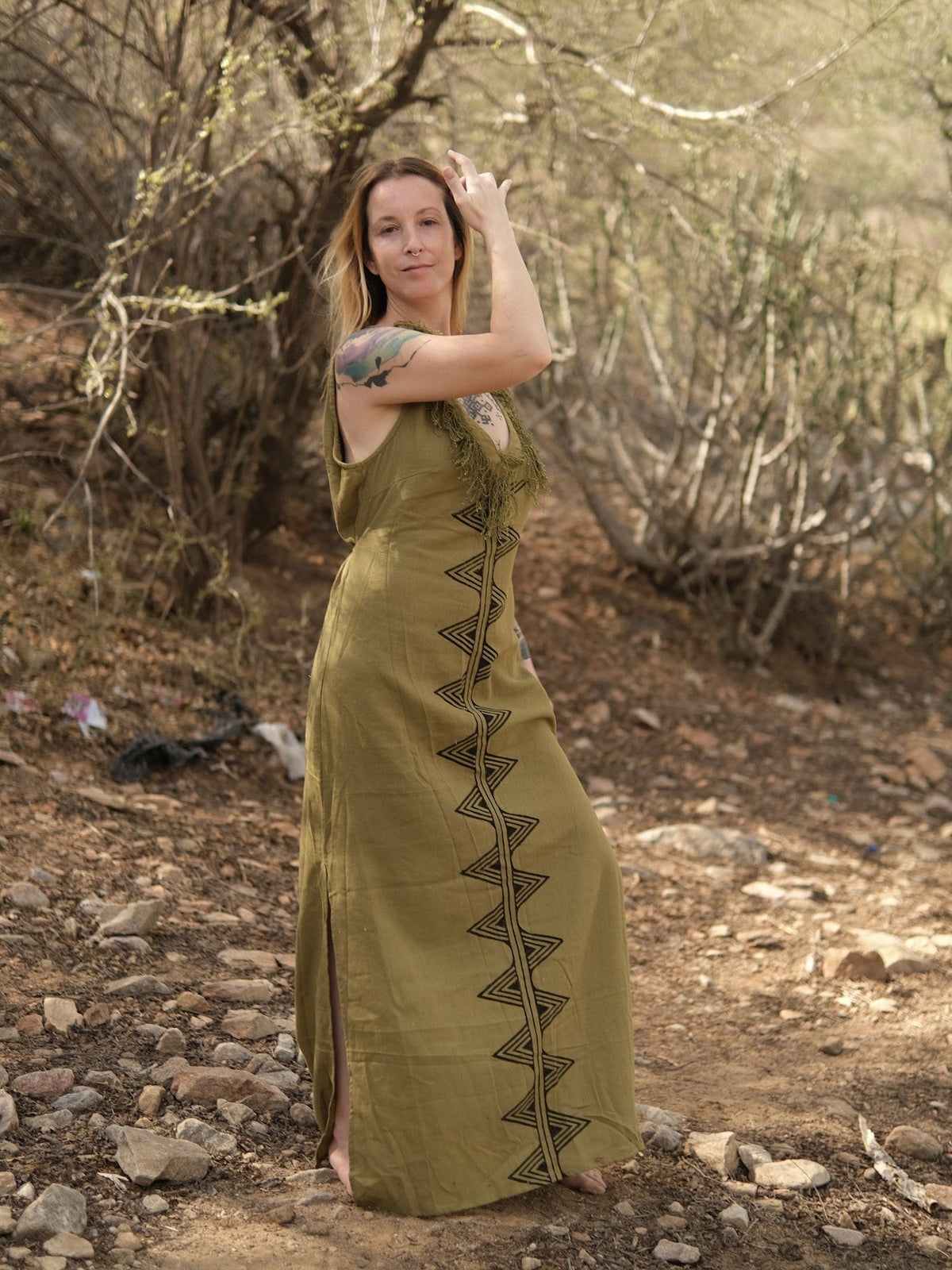 Sandhya olive green khadi cotton maxi dress, side profile of fringe V-neck and flowy skirt