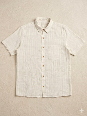 Shwet Shirt flat lay – men's ivory textured cotton short-sleeve shirt with collar, buttons and chest pocket