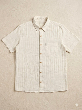Shwet Shirt flat lay – men's ivory textured cotton short-sleeve shirt with collar, buttons and chest pocket