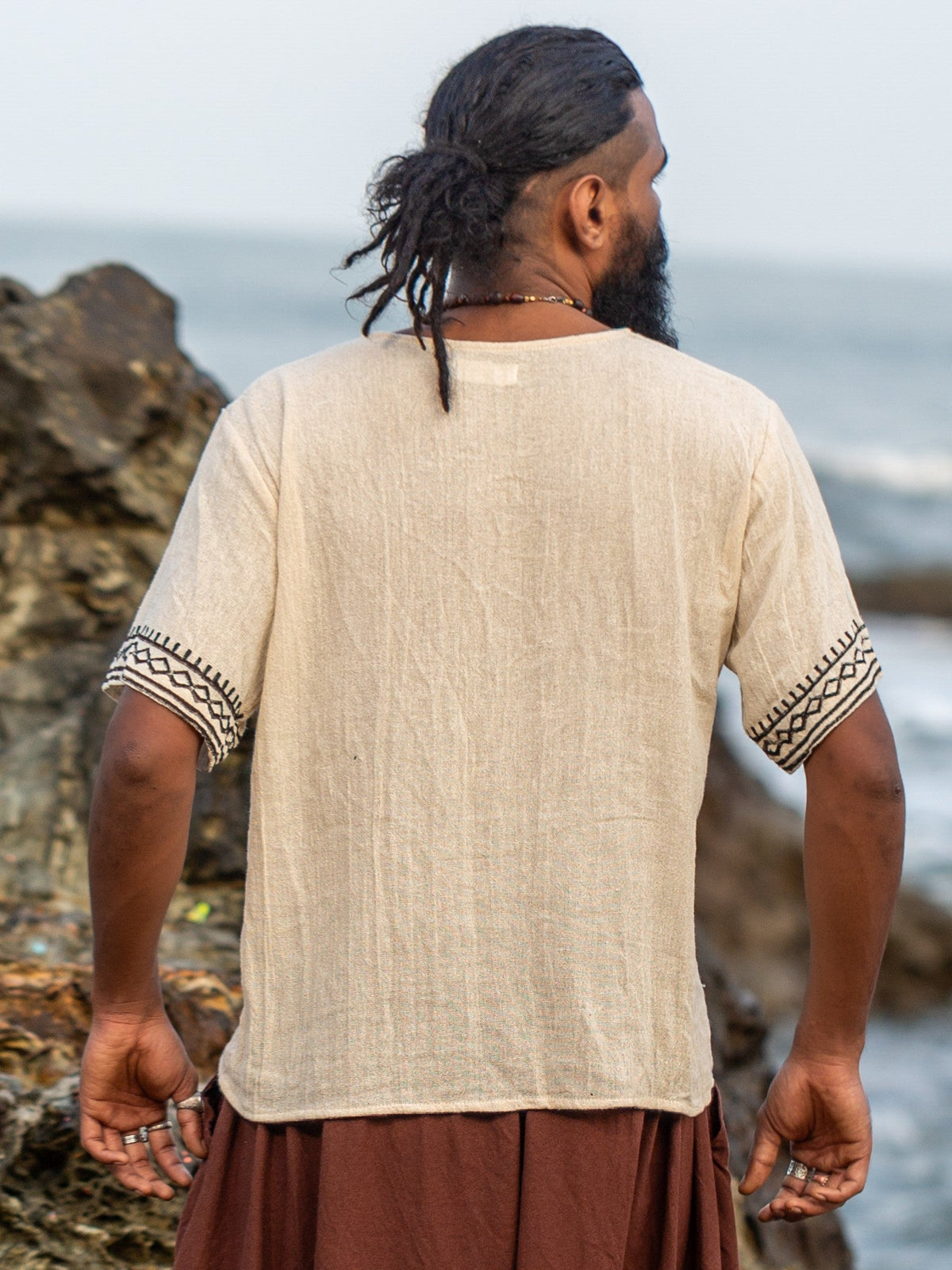 Back view of the Tribal T-Shirt showing the loose relaxed silhouette and boxy hem