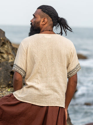 Back view of the Tribal T-Shirt in plain natural cotton with no print on the back panel