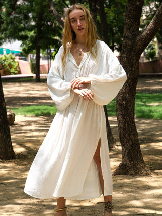 White button-front maxi dress showing the thigh-high side slit