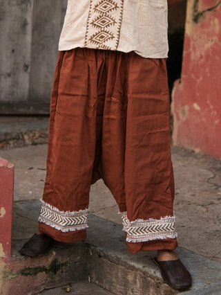 Brown Yogi Palazzo Pants, close up of the ankle hem's frayed chevron trim