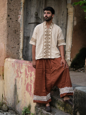 Brown Yogi Palazzo Pants, full body side view styled with a tribal print shirt